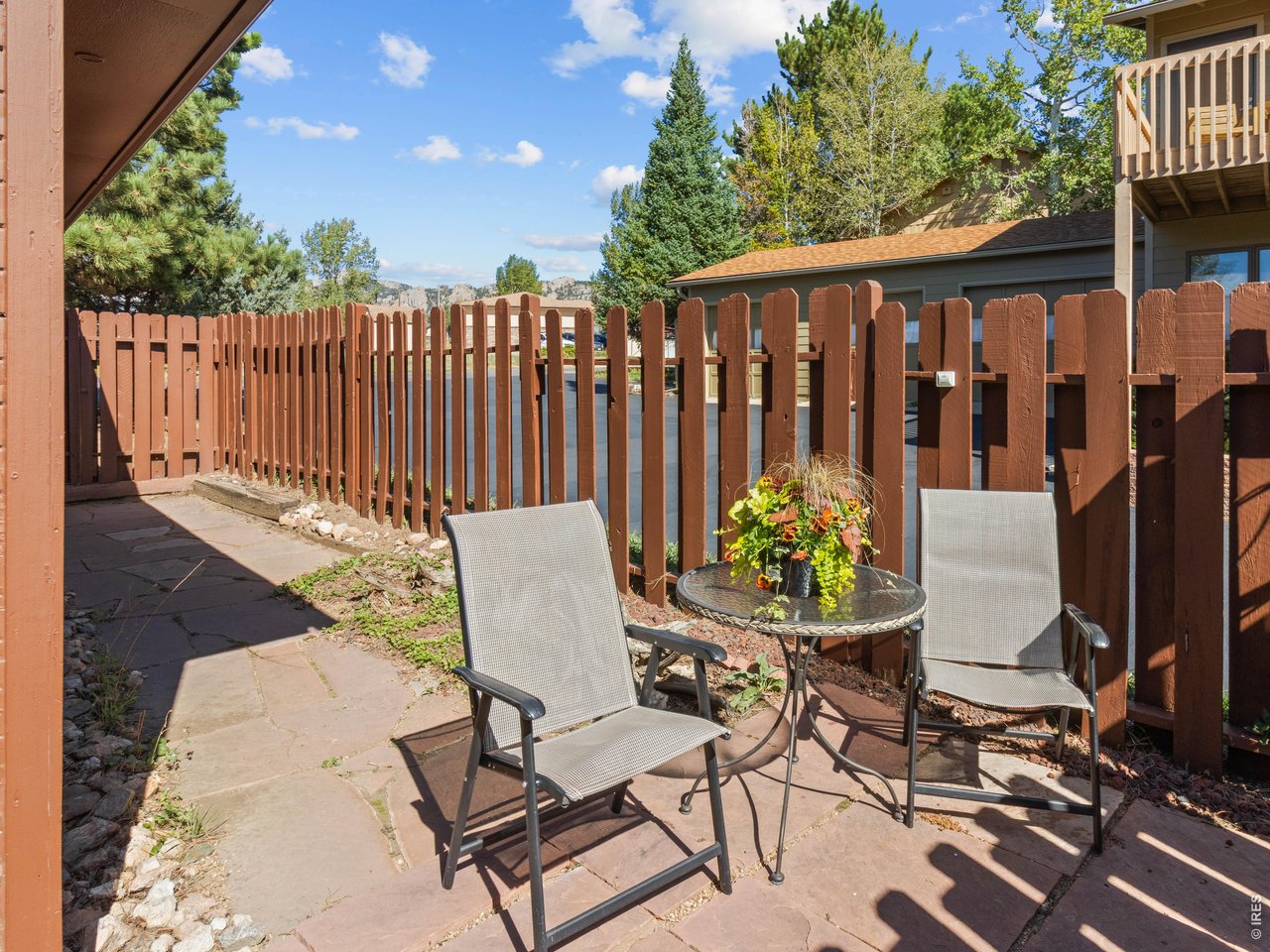 Property Photo 25 Enclosed, private patio has a gate to the side yard