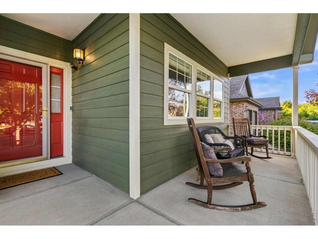 Property Photo 3 Relax on the wide front porch.