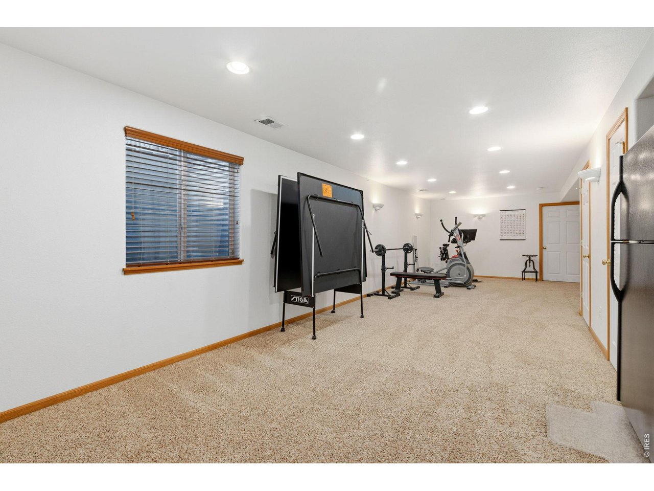Property Photo 20 Massive rec room in basement (34 x 15).