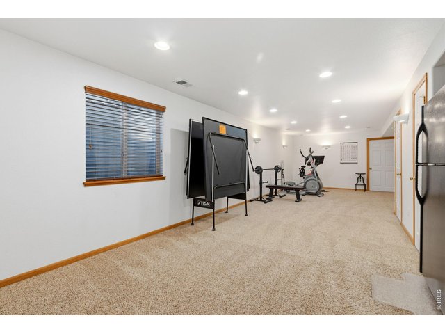 Property Photo 20 Massive rec room in basement (34 x 15).