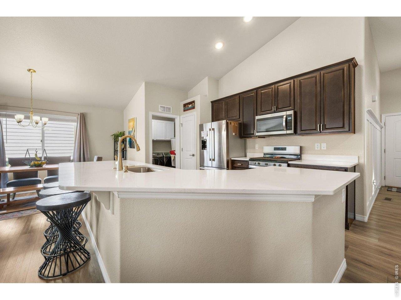 Property Photo 17 Large bar area with beautiful quartz countertop