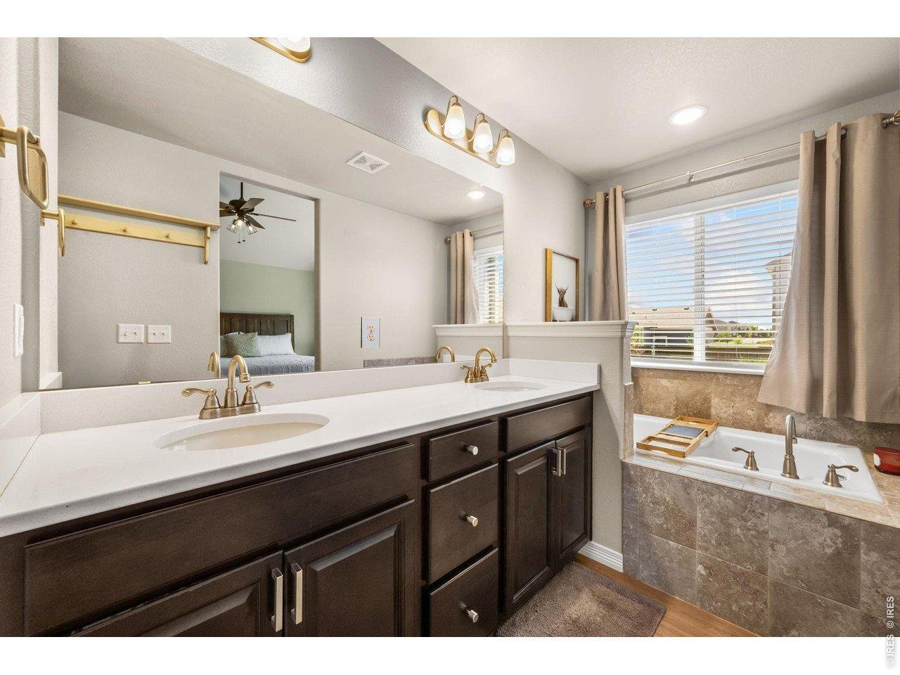 Property Photo 23 Primary bathroom with sunken tub