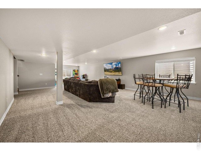 Property Photo 30 Lots of room to play or entertain in the basement family room