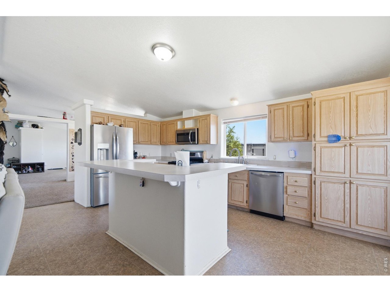 Property Photo 14 Great kitchen island for food prep and also for bar stool seating.