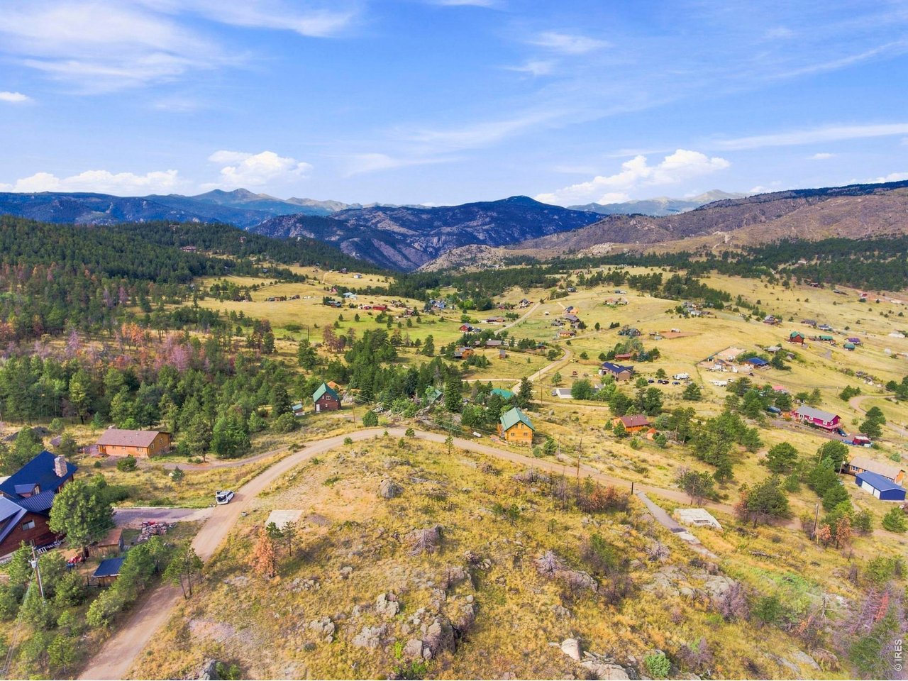 Property Photo 8 Looking west you have a perfect view of the Rockies with Long's Peak forefront.