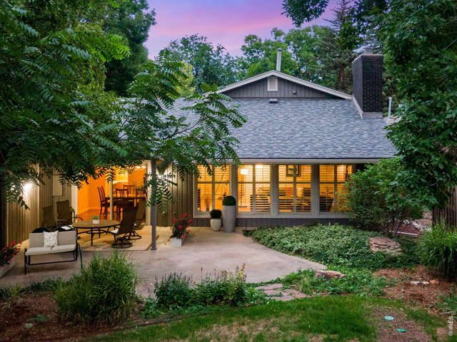 Property Photo 7 A backyard sanctuary, perfect for the Colorado outdoor enthusiast and cultivated with care, Massive covered and uncovered patio! A gardener's private retreat!