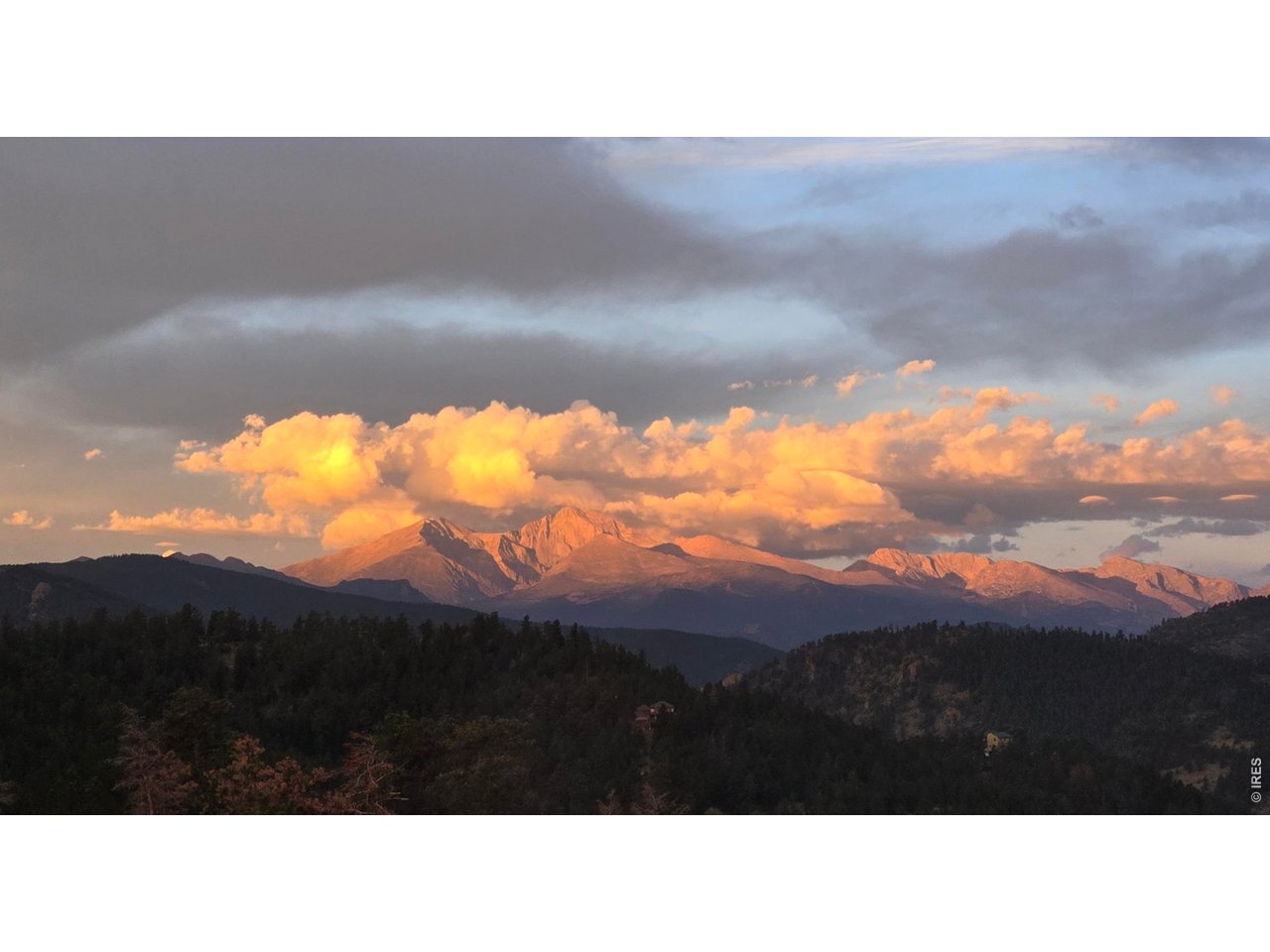 Property Photo 4 Enjoy the views of brilliant weather patterns and sunsets every day from your own home.