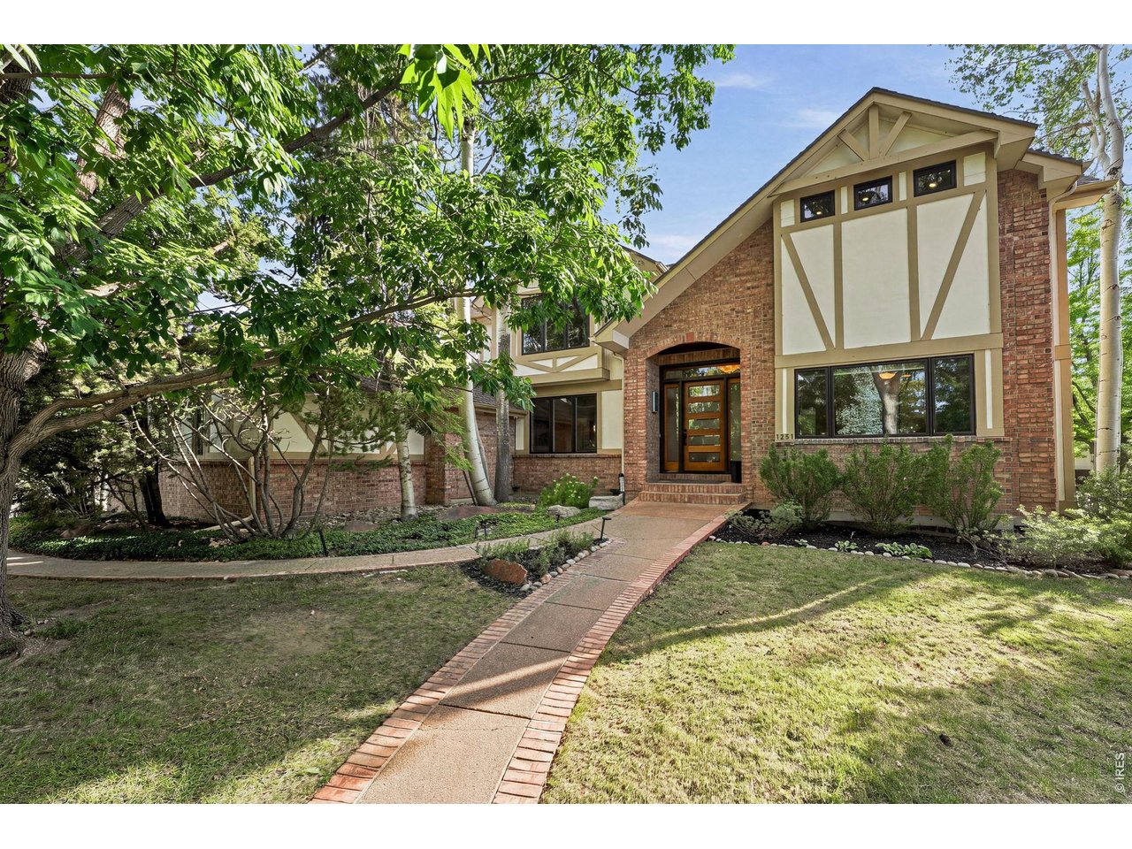 Property Photo 2 Front Entry-Expansive Corner Lot