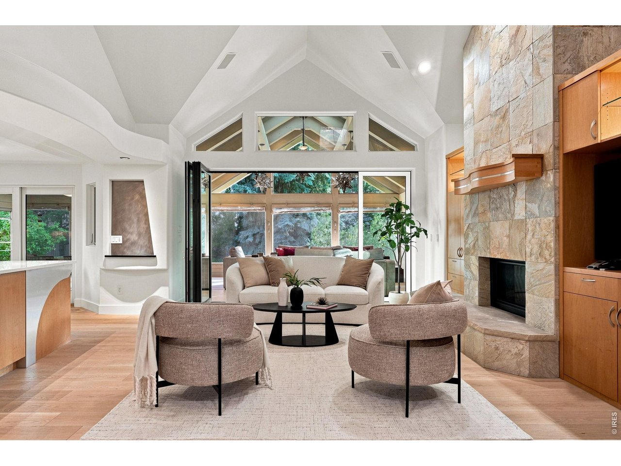 Property Photo 6 Family Room opening to the sunroom