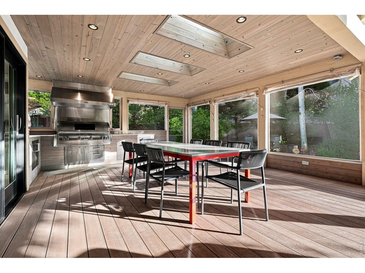 Property Photo 18 Outdoor Dining with Skylights with retractable shades