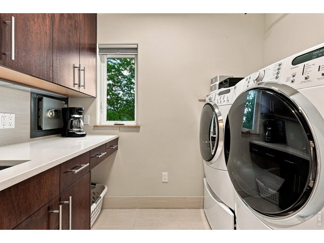 Property Photo 30 Upstairs Laundry room and coffee station