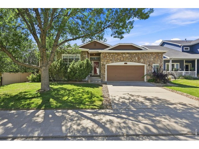Property Photo 1 Mature landscaping and OVERSIZED garage!