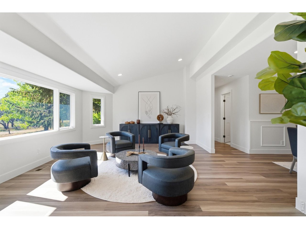 Property Photo 7 You're immediately greeted by a large living room off the foyer.
