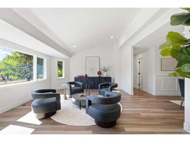 Property Photo 7 You're immediately greeted by a large living room off the foyer.