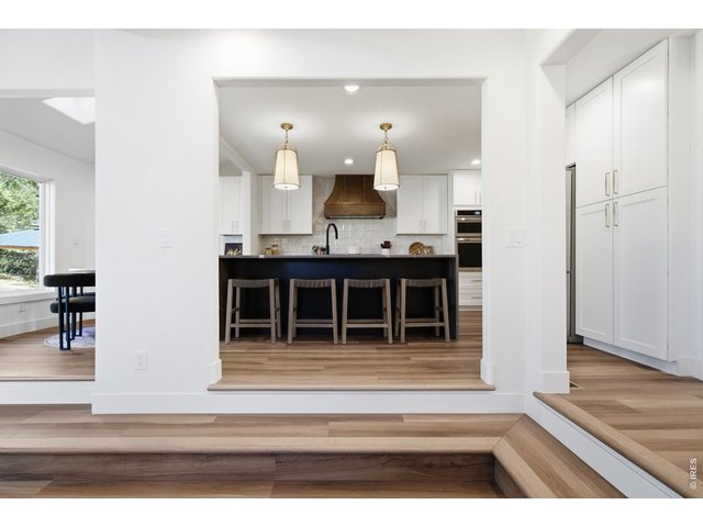 Property Photo 14 The kitchen feels separate enough to be it's own space, while still connected to the rest of the entertaining spaces.