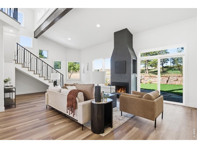 Property Photo 19 The large wood fireplace is the focal point of the family room.