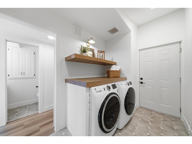 Property Photo 24 Laundry and mud room off of the garage offers a great drop zone.