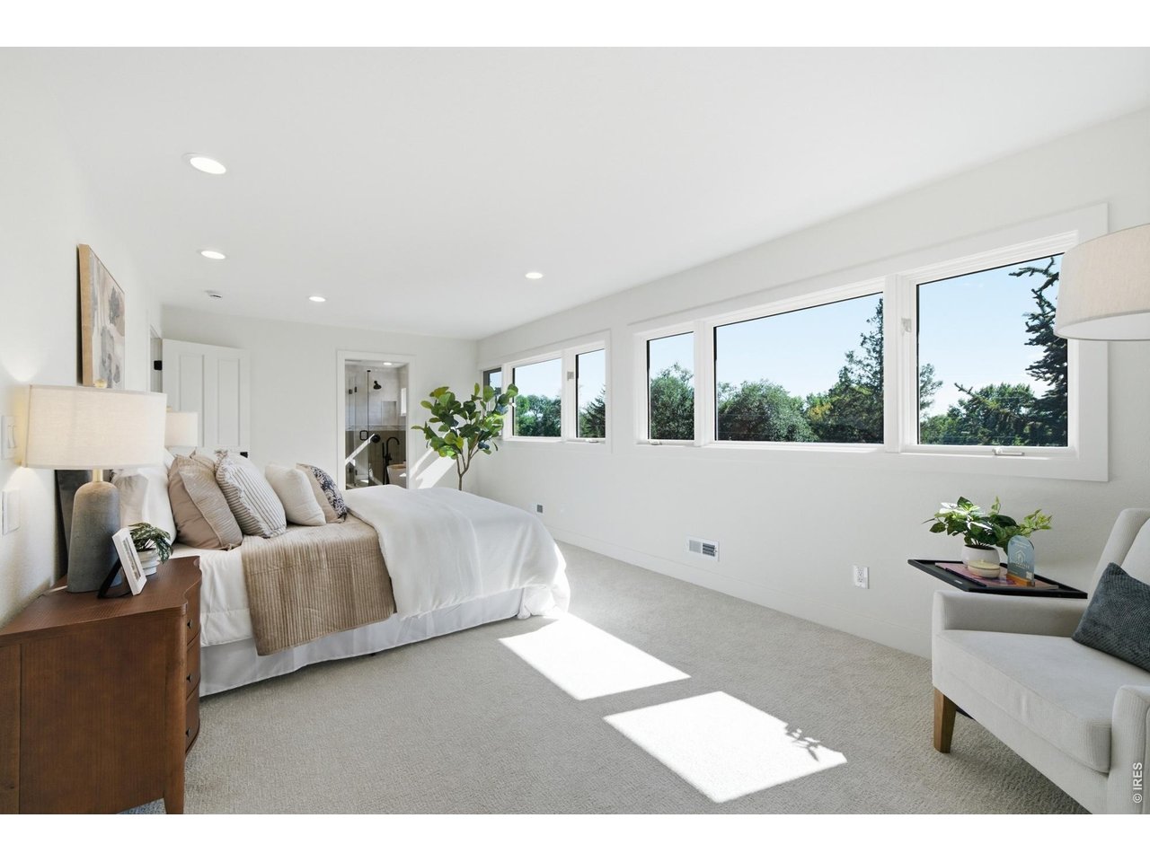 Property Photo 33 Large windows spanning the southern side offer views out to the mountains.