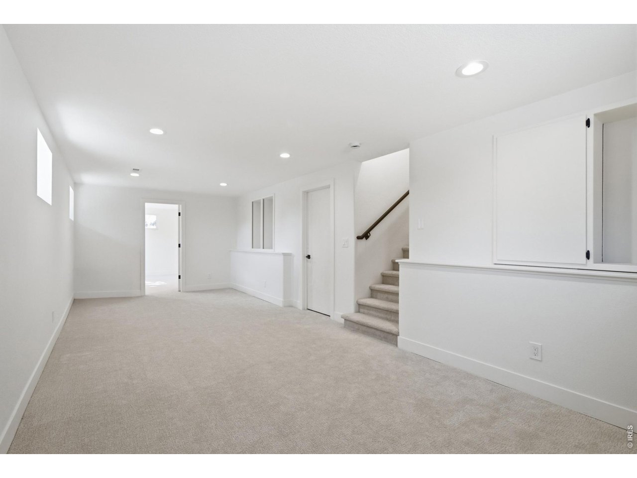 Property Photo 36 The daylight basement provides for an added rec-room, as well as storage in the crawlspace.