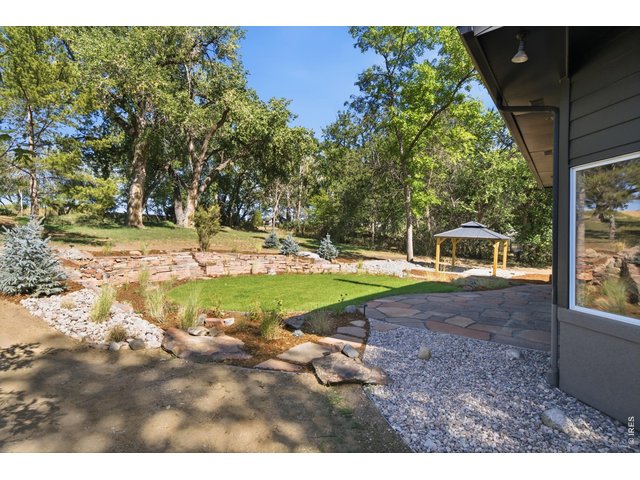 Property Photo 38 Step outside to your private and secluded backyard sanctuary.