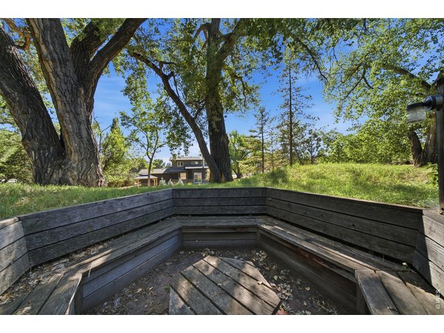 Property Photo 43 Halfway towards the lake is a sunken firepit where you can look up at the stars while roasting marshmellows.