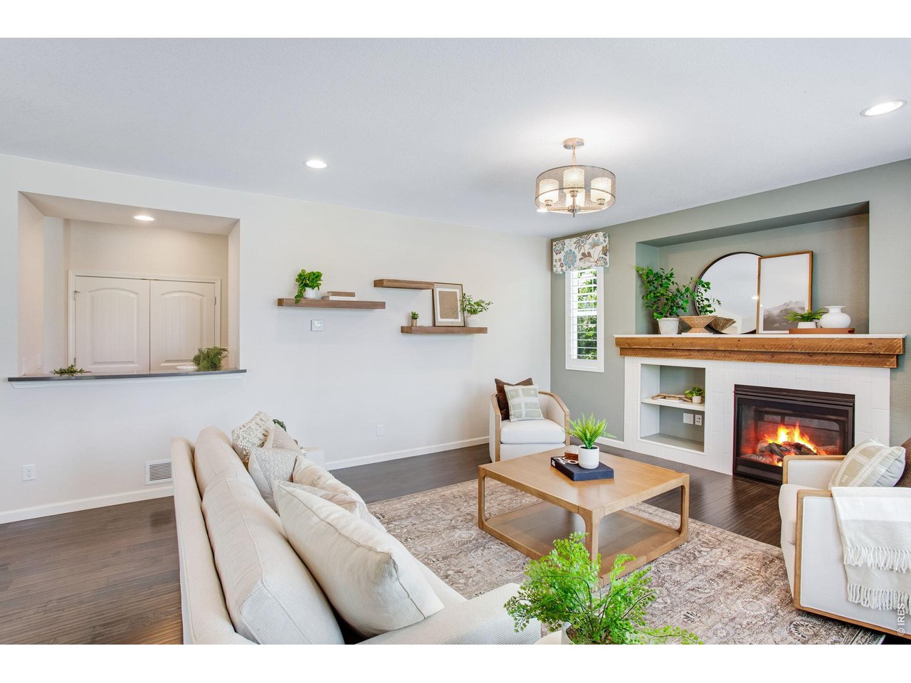Property Photo 14 Family room with gas fireplace and custom mantel