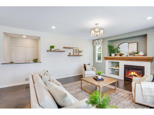 Property Photo 14 Family room with gas fireplace and custom mantel