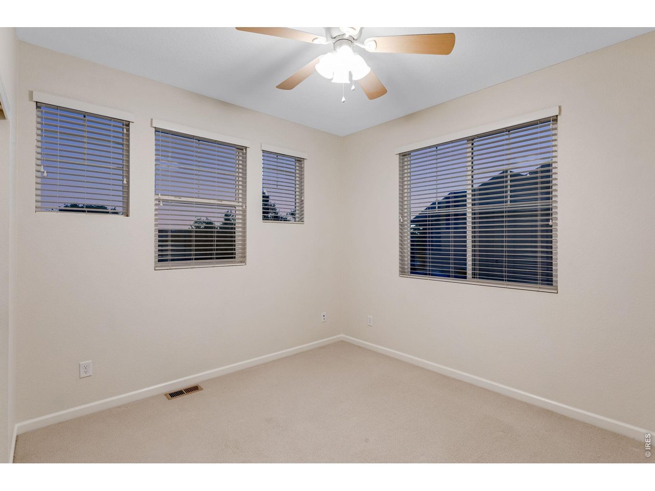 Property Photo 36 Bed 3 of 43 up with a ceiling fan.