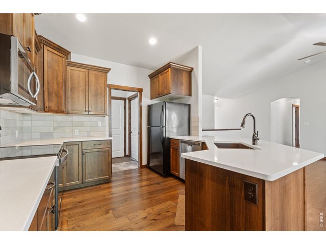 Property Photo 13 Beautiful cabinetry and luxury vinyl floor