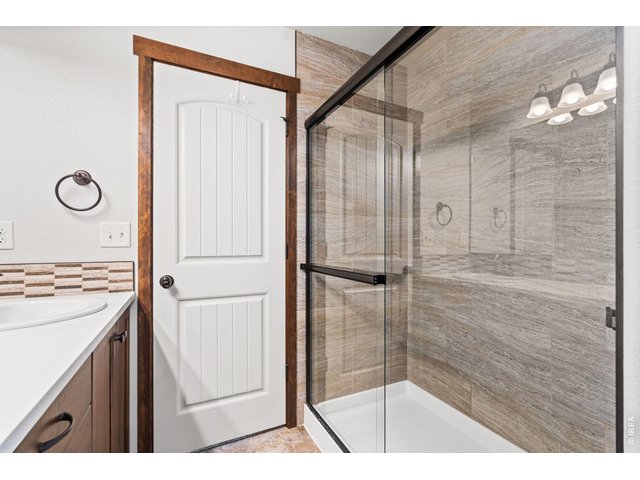 Property Photo 24 Oversized walk in shower in primary bath