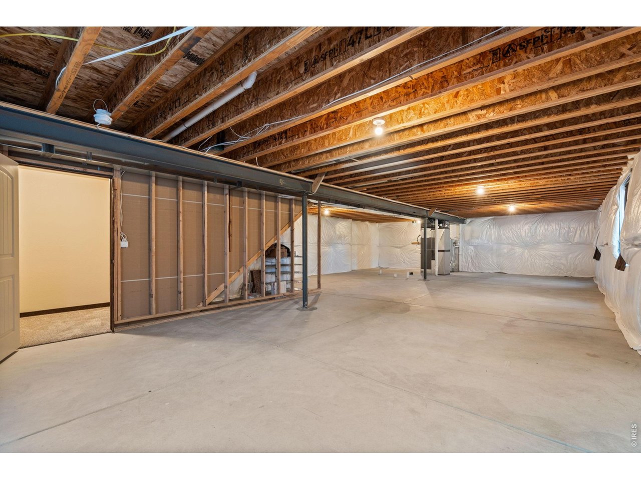 Property Photo 26 Full unfinished basement to expand living area