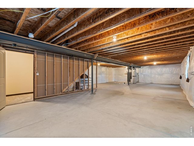 Property Photo 26 Full unfinished basement to expand living area