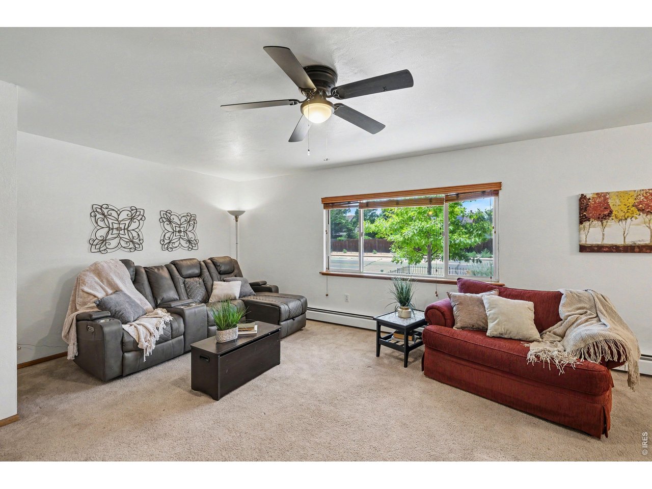 Property Photo 5 The large west facing picture window brings in an abundance of natural light.