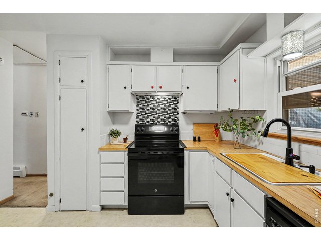 Property Photo 8 Glass top electric range installed in 2024.