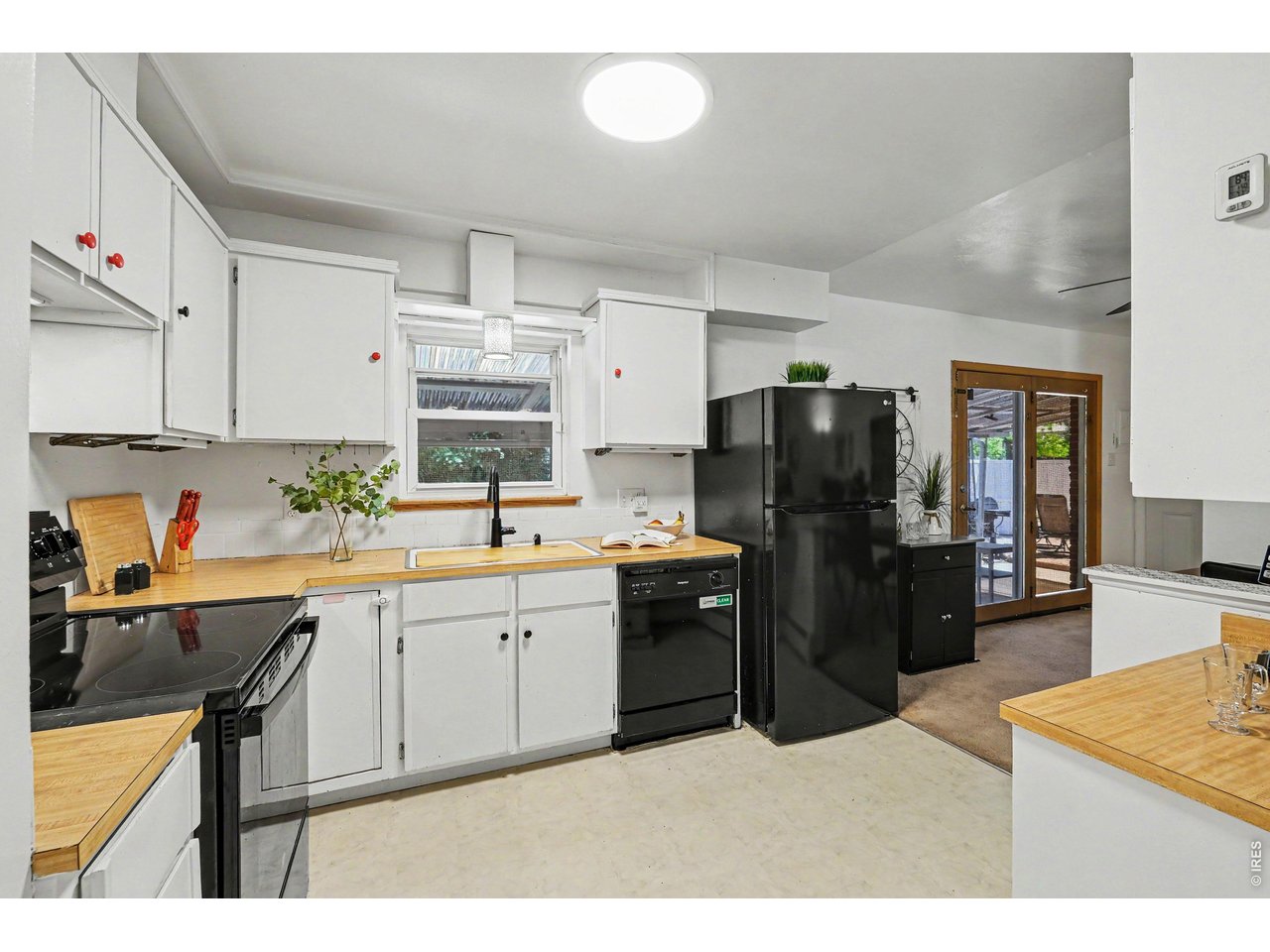 Property Photo 7 All appliances (free-standing microwave not pictured) are included. Oven/Range installed in 2024 and Refrigerator installed in 2022.