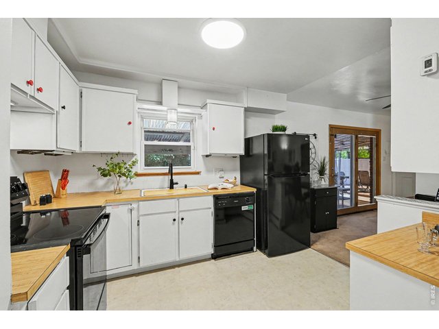 Property Photo 7 All appliances (free-standing microwave not pictured) are included. Oven/Range installed in 2024 and Refrigerator installed in 2022.