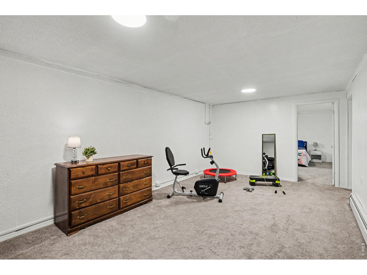 Property Photo 16 Features a large rec room.