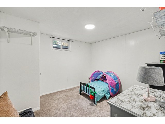 Property Photo 18 Bedroom four located in basement.