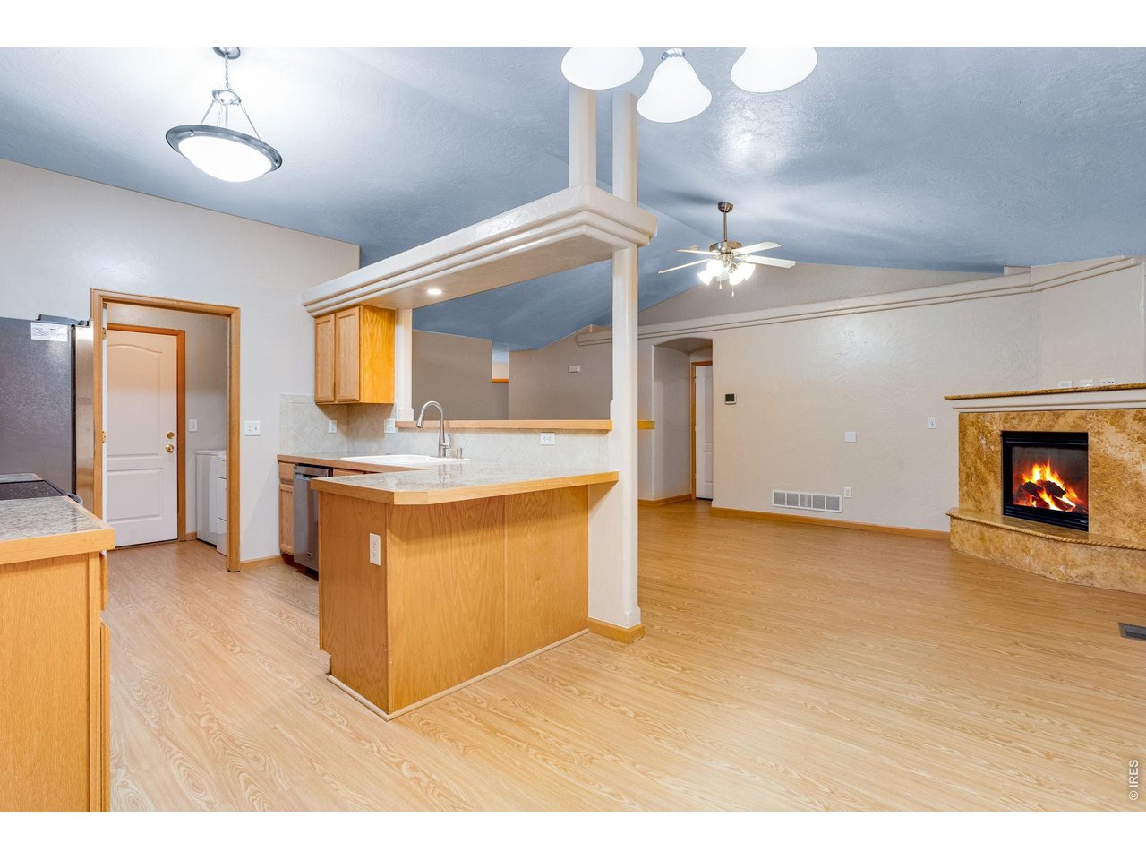 Property Photo 15 Kitchen features granite tile countertops, lazy Susan, full tile backsplash, and all kitchen appliances which are included