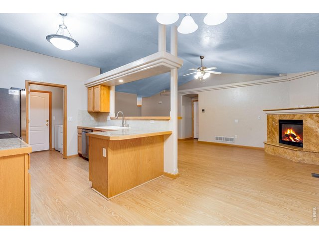 Property Photo 15 Kitchen features granite tile countertops, lazy Susan, full tile backsplash, and all kitchen appliances which are included
