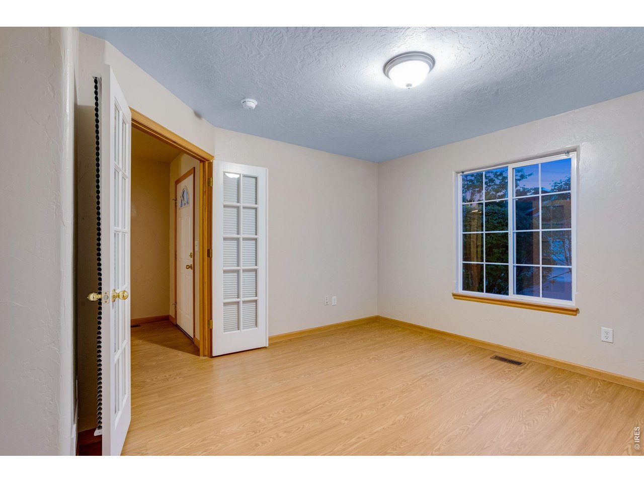 Property Photo 25 Front office or conforming bedroom with French doors