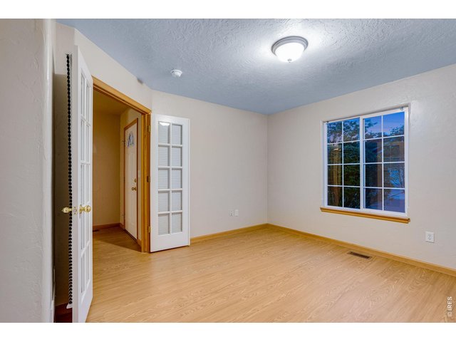 Property Photo 25 Front office or conforming bedroom with French doors