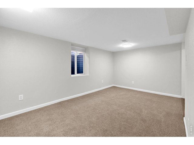 Property Photo 24 New carpet throughout the entire Basement.