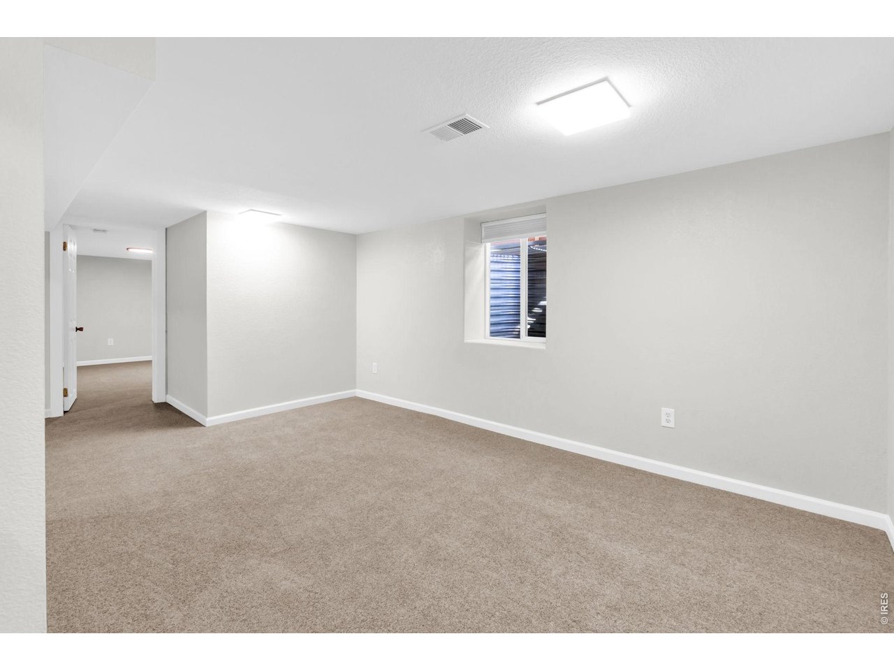 Property Photo 23 Basement Living area.