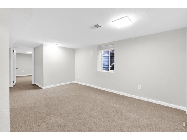 Property Photo 23 Basement Living area.