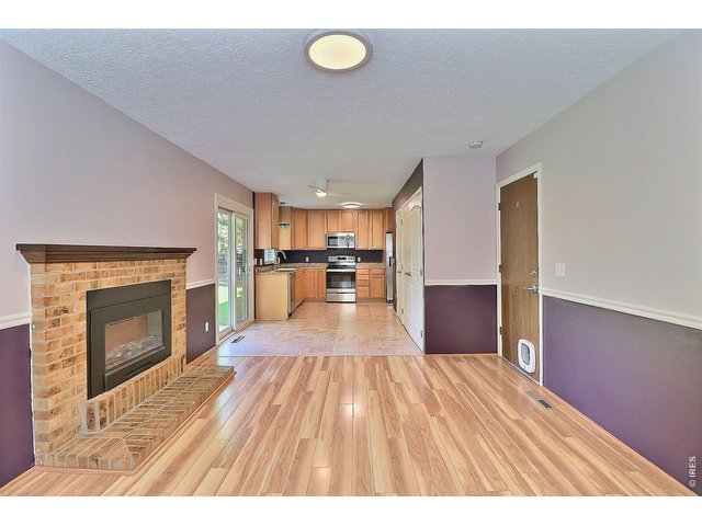 Property Photo 18 Family Room with Fireplace