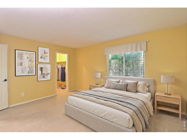 Property Photo 19 Primary Bedroom Staged
