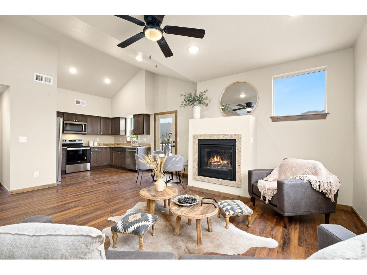 Property Photo 1 Spacious living room with vaulted ceilings.