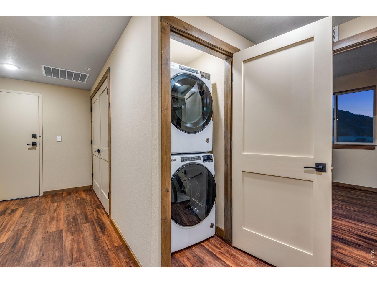 Property Photo 14 Stackable laundry in unit.