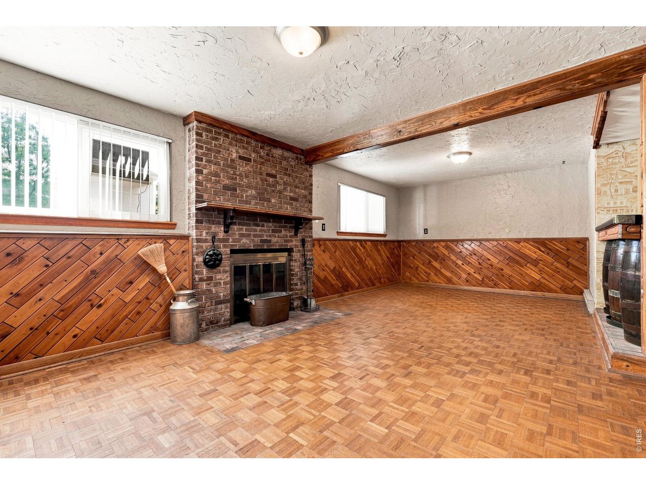 Property Photo 28 Family Room with fireplace and bar area